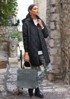 Steppmantel In Oversized-Form Schwarz -Madeleine Mode 85e2ae46c2de3129871fea1cb4721acc