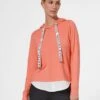 MIT KAPUZE UND LAYERING-EFFEKT - Kapuzenpullover - Apricot -Madeleine Mode befc6b6dc4ed431aa3e28d8e0100c9c0