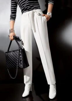 Knöchellange Bundfaltenhose Wollweiß -Madeleine Mode d13c1f9bcd45563c57fc5c196ccf3a9b